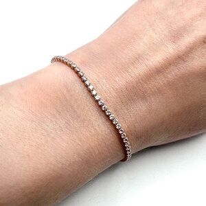 Rose Gold Over Sterling Silver CZ Tennis Bracelet Purchased From Freida Rothman